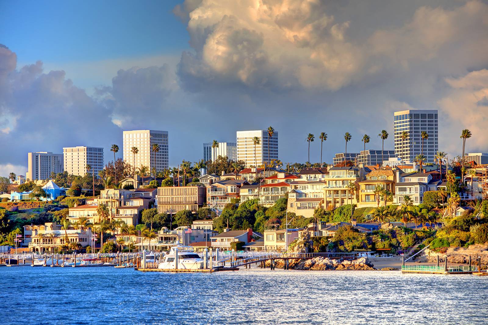 The Newport Beach, California coastline and harbor at golden hour
